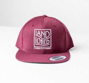 Landlocked Logo Snapback Hat