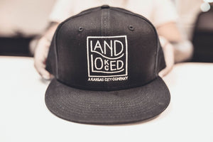 Landlocked Logo Snapback Hat